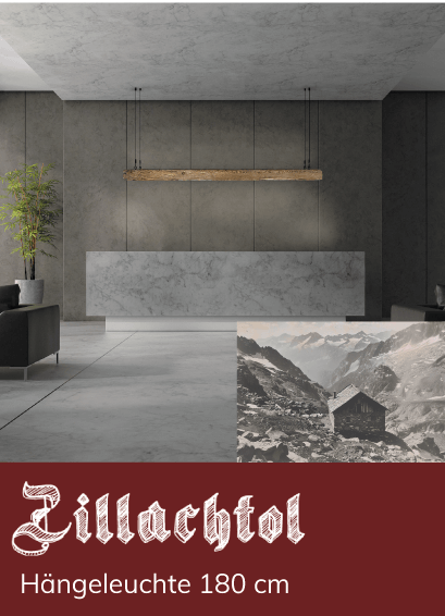 Eine lange, h&auml;ngende Holzleuchte erhellt einen modern eingerichteten Raum mit grauen W&auml;nden und Marmorelementen. Text: &bdquo;Zillachtol H&auml;ngeluchte 180 cm&ldquo;. Im Hintergrund ein Schwarzwei&szlig;bild einer Bergh&uuml;tte.